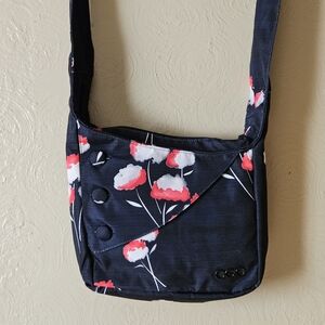 Ogio Le Fleur Navy Floral Crossbody bags.